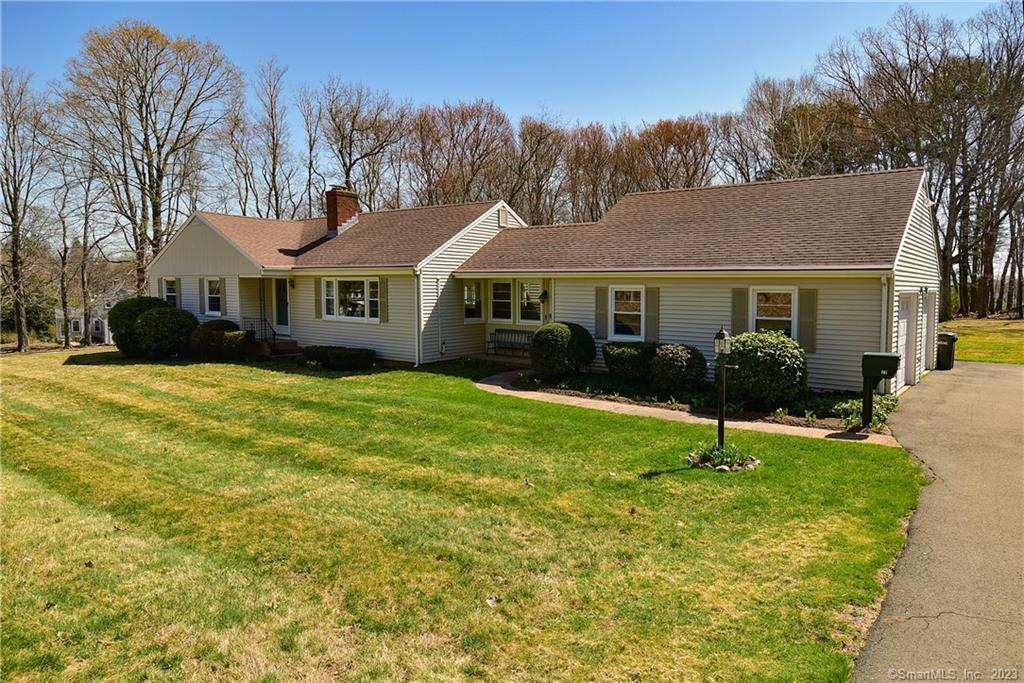 22 Volpi Road Bolton, CT 06043 - Photo 1 of 1 a front view of house with yard and green space