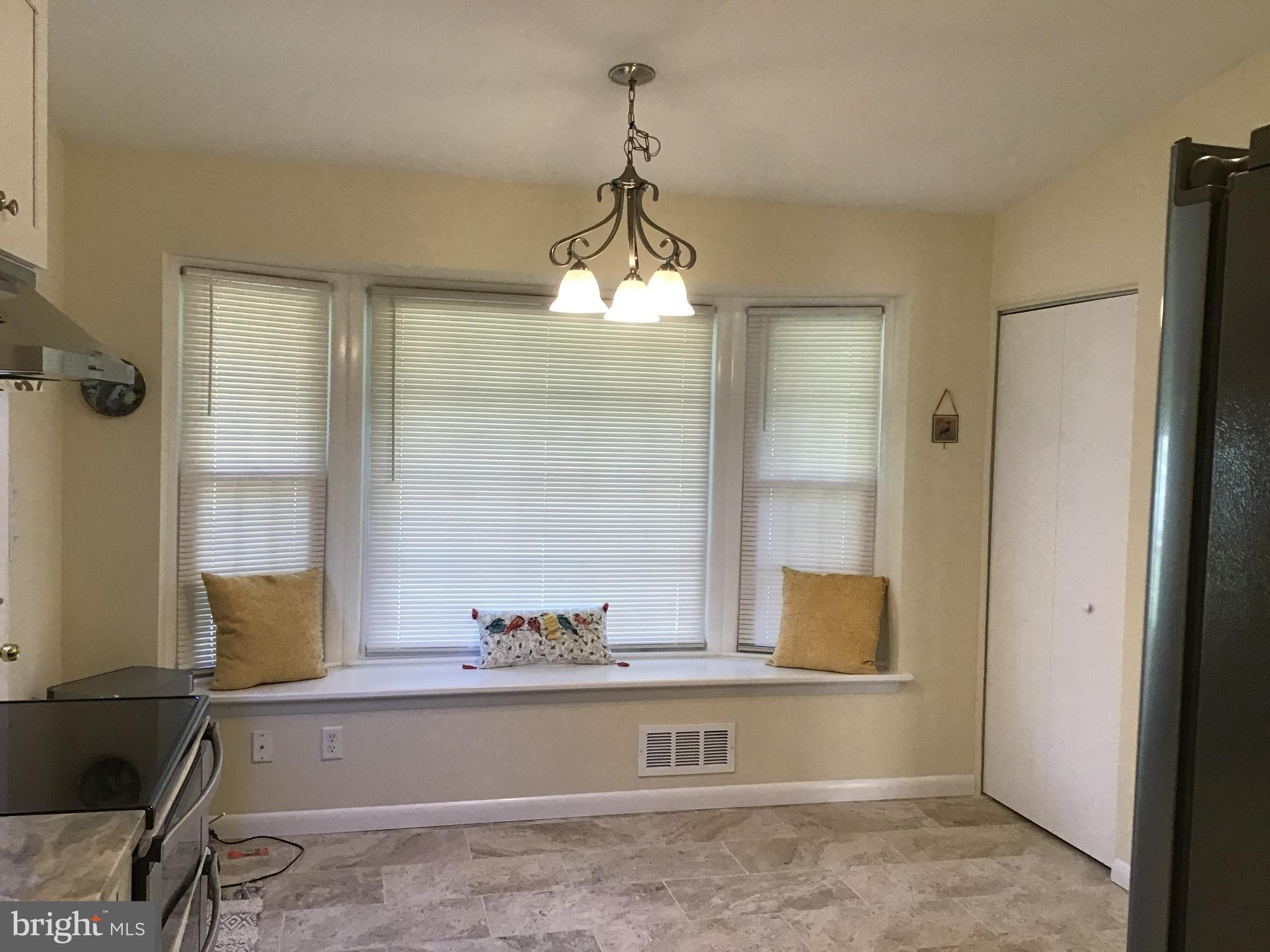 13015 Hathaway Drive Silver Spring, MD 20906 - Photo 3 of 41 Large Bay Window with bench seating