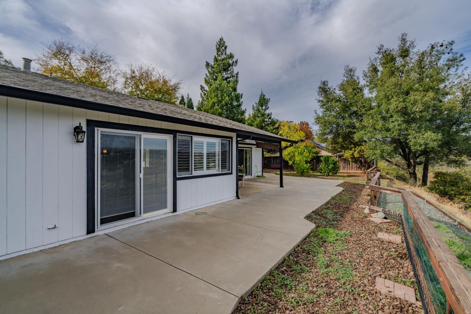 10370 Spunn Road Jackson, CA 95642 - Photo 19 of 87 a front view of a house with a garden