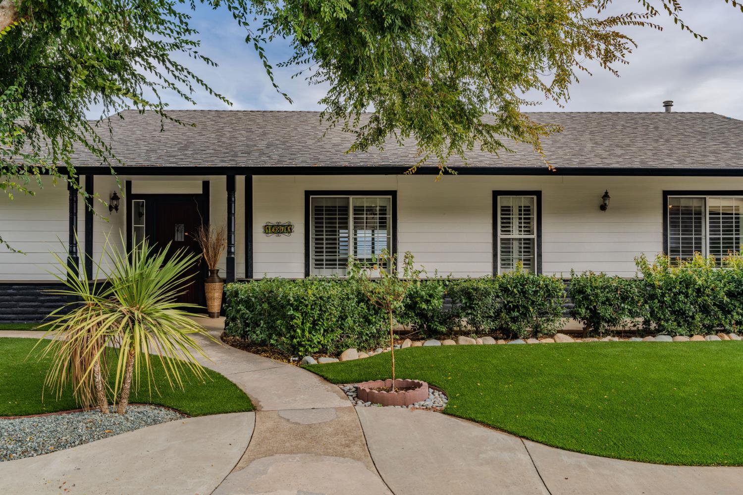 10370 Spunn Road Jackson, CA 95642 - Photo 29 of 87 a front view of a house with a garden