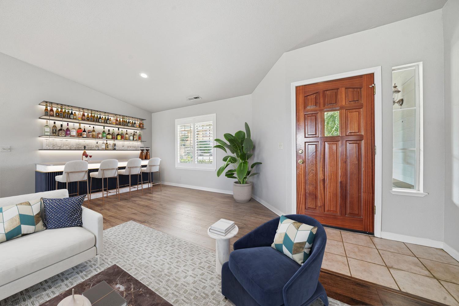 10370 Spunn Road Jackson, CA 95642 - Photo 40 of 87 a living room with furniture and a potted plant