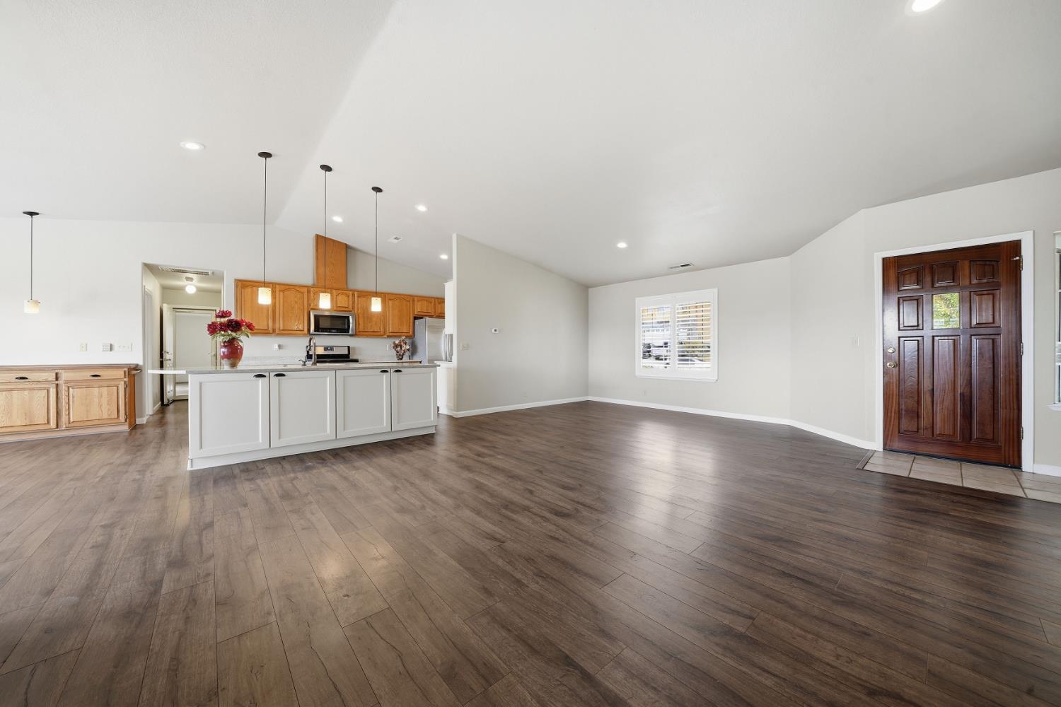 10370 Spunn Road Jackson, CA 95642 - Photo 44 of 87 a view of a kitchen with a wooden floor and a kitchen