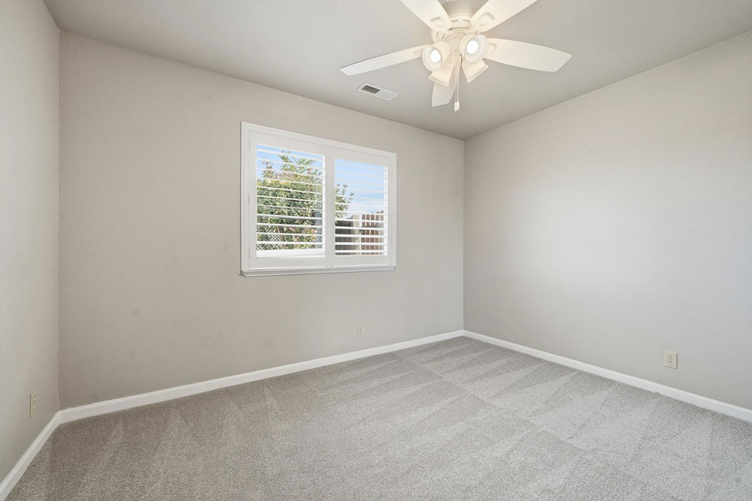 10370 Spunn Road Jackson, CA 95642 - Photo 66 of 87 an empty room with a window and a fan