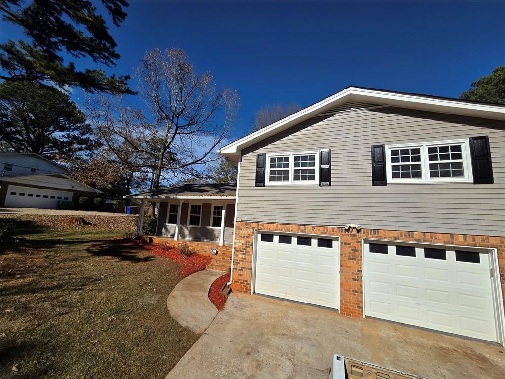 4330 Dogwood Farm Road Lithonia, GA 30038 - Photo 2 of 11 a front view of a house with a yard
