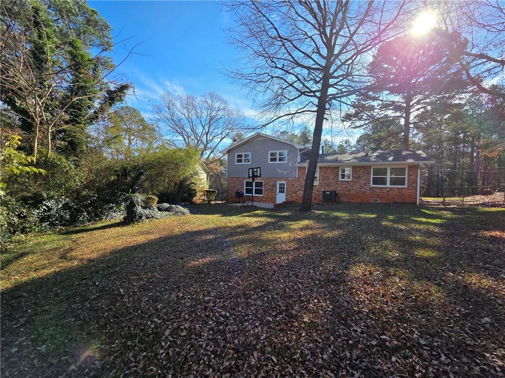 4330 Dogwood Farm Road Lithonia, GA 30038 - Photo 3 of 11 a view of a house with a yard