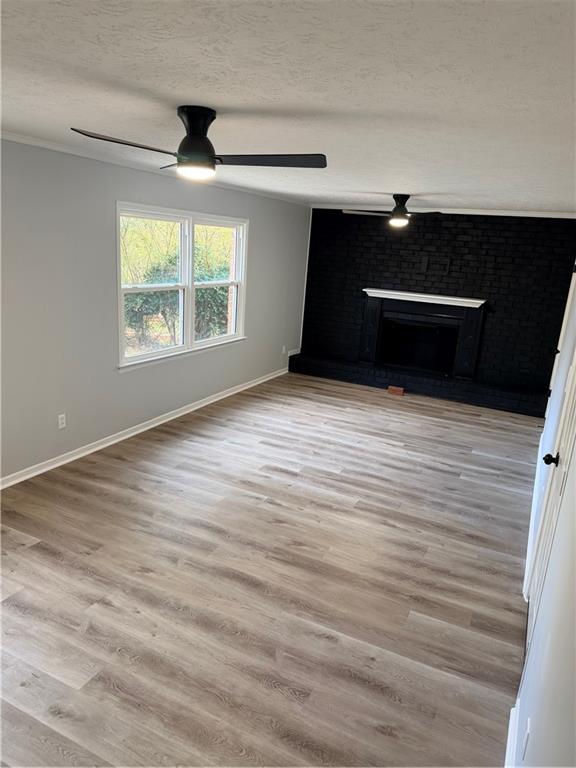 4330 Dogwood Farm Road Lithonia, GA 30038 - Photo 9 of 11 an empty room with wooden floor and windows