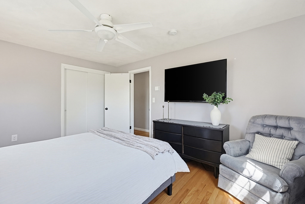 18 Anchorage Road Franklin, MA 02038 - Photo 27 of 42 a bedroom with a bed and a flat screen tv