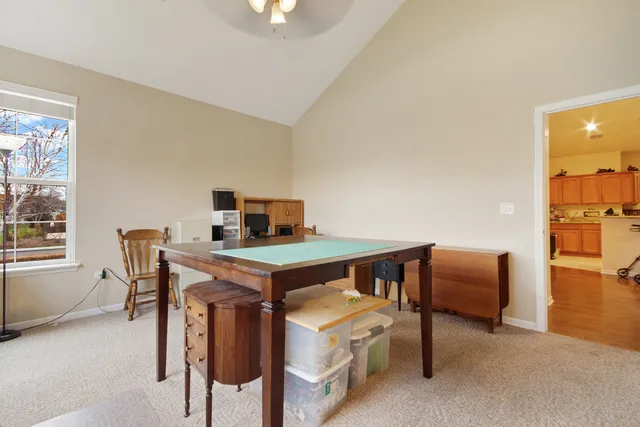 a view of a livingroom with furniture and window