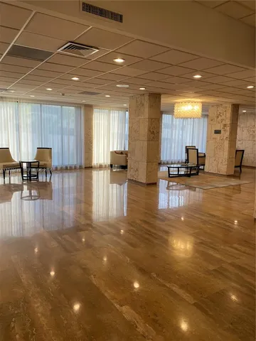 a bedroom with a bed and a table in it