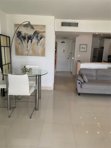 a view of a dining room with furniture