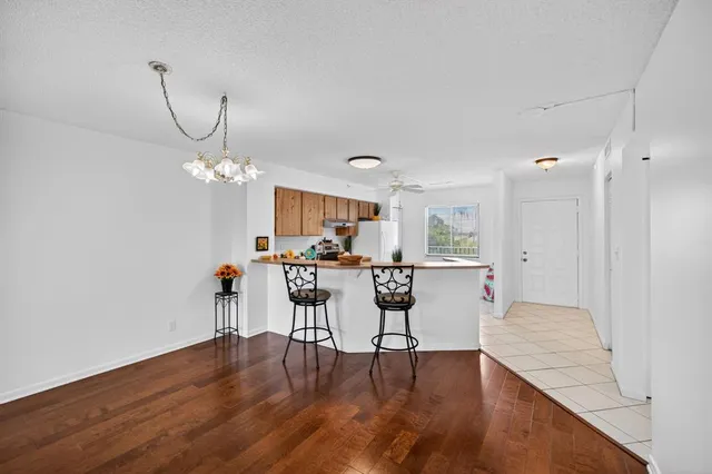 a view of a livingroom with furniture and wooden floor