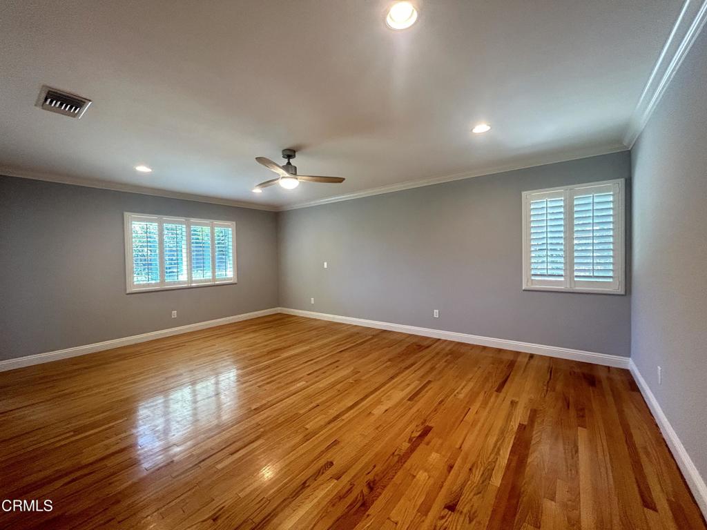 5026 Hook Tree Road La Canada Flintridge, CA 91011 - Photo 13 of 25 a view of an empty room with wooden floor and a window