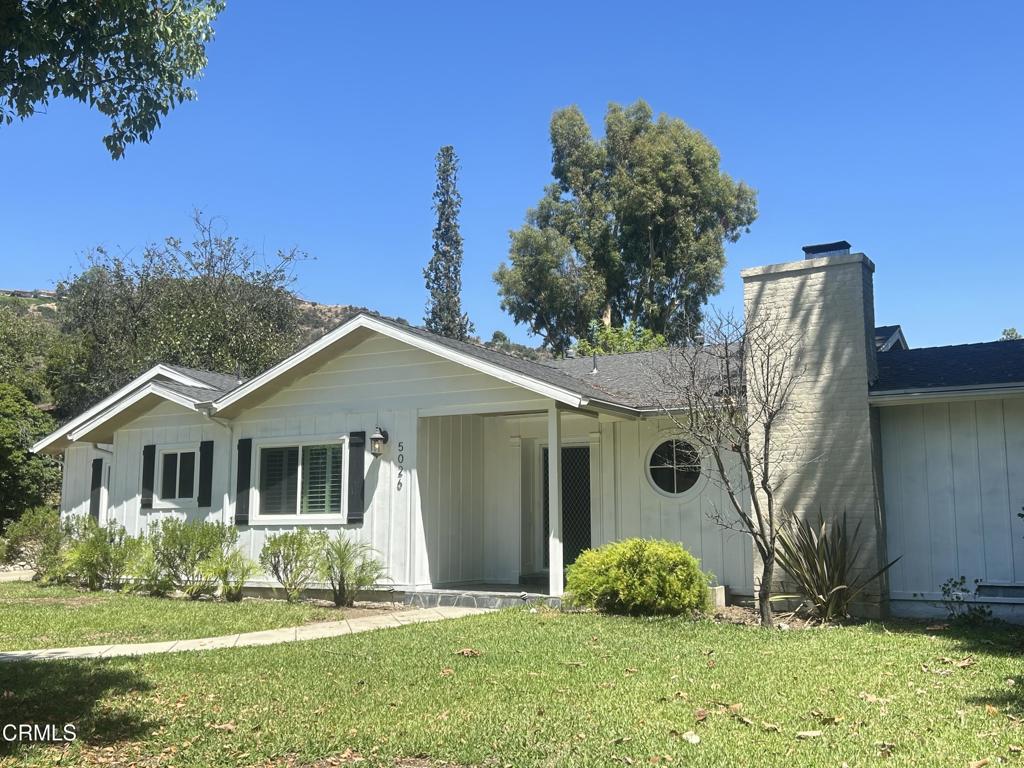 5026 Hook Tree Road La Canada Flintridge, CA 91011 - Photo 2 of 25 a front view of a house with a yard