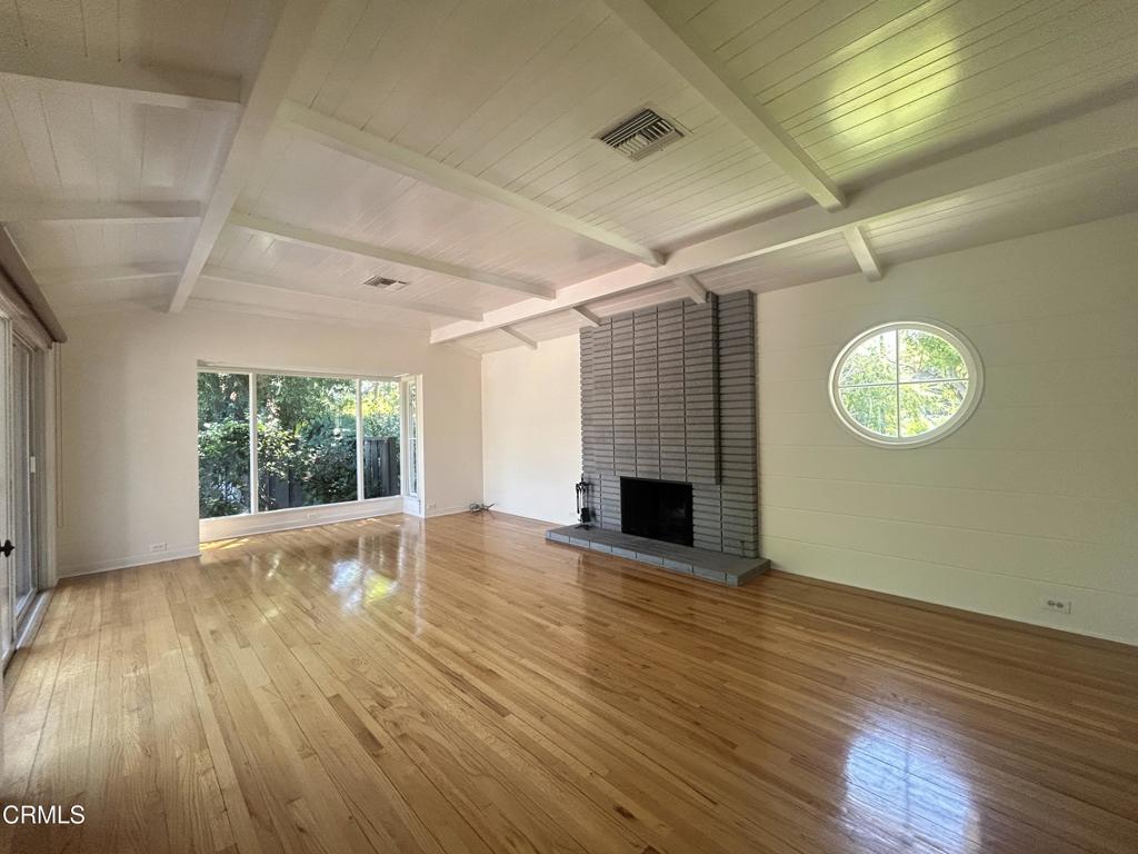 5026 Hook Tree Road La Canada Flintridge, CA 91011 - Photo 4 of 25 a view of empty room with wooden floor and fan