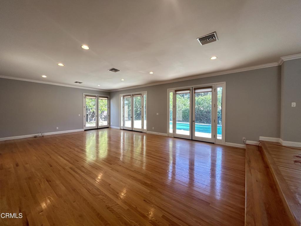 5026 Hook Tree Road La Canada Flintridge, CA 91011 - Photo 7 of 25 a view of empty room with wooden floor and fan