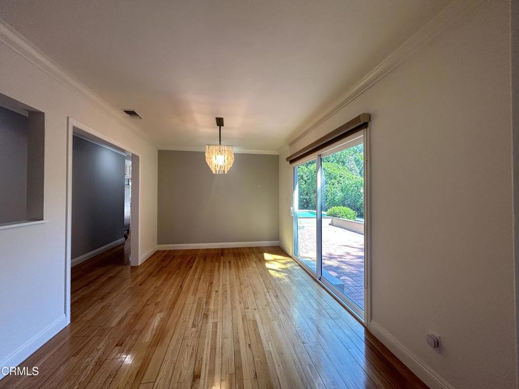 5026 Hook Tree Road La Canada Flintridge, CA 91011 - Photo 10 of 25 a view of empty room with wooden floor and fan