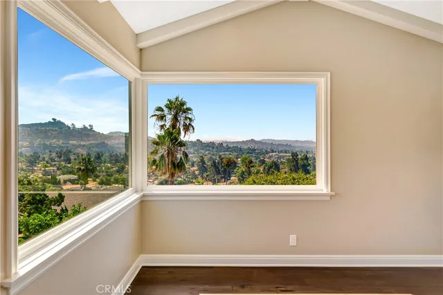 a kitchen with stainless steel appliances granite countertop a stove and cabinets