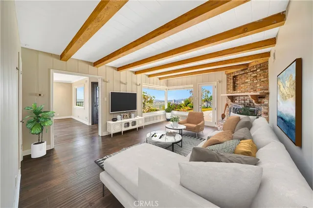 a bathroom with a granite countertop sink a mirror and a shower