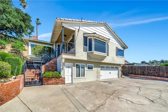 front view of a house with a large windows