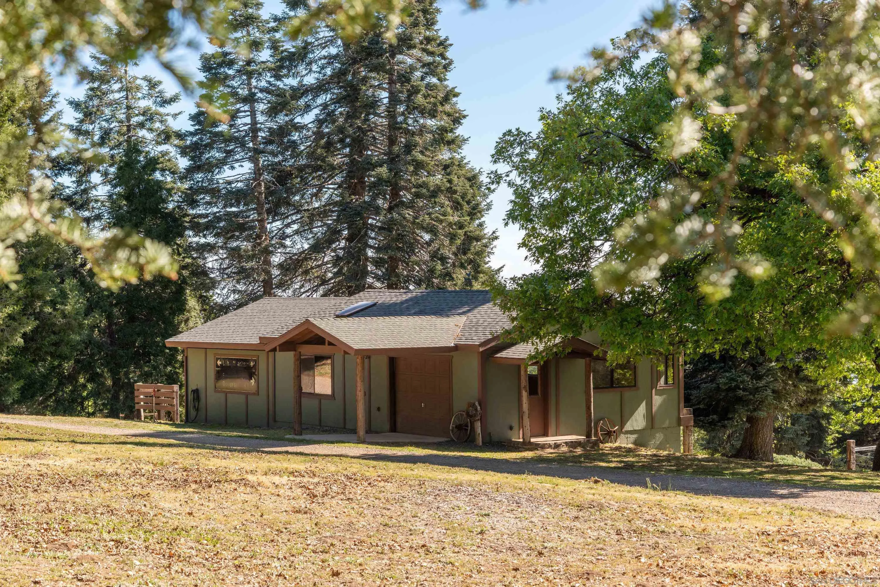 3413 Fern Meadow Road Palomar Mountain, CA 92060 - Photo 24 of 38 a front view of a house with a yard
