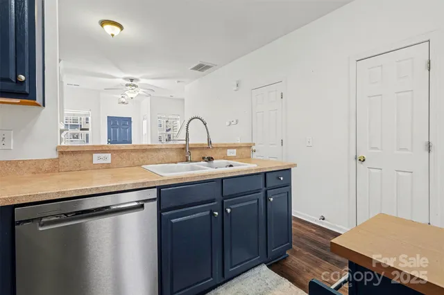 a bathroom with a sink double vanity and a mirror