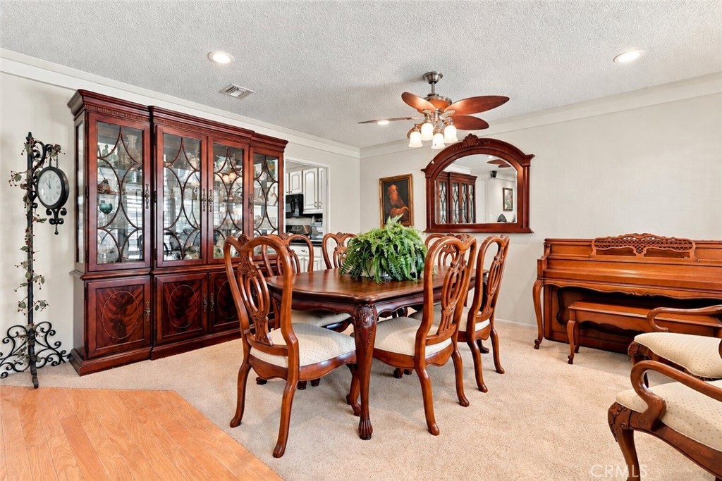 8554 Hillside Road Rancho Cucamonga, CA 91701 - Photo 17 of 40 Formal dining room off entry and family/living room