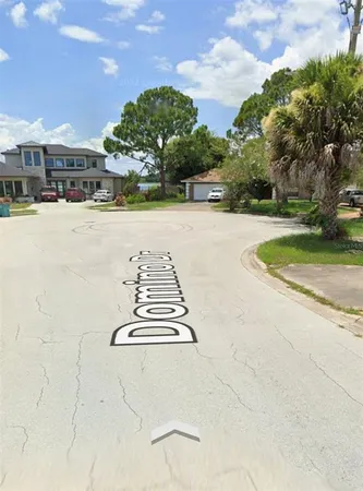 a view of street with houses