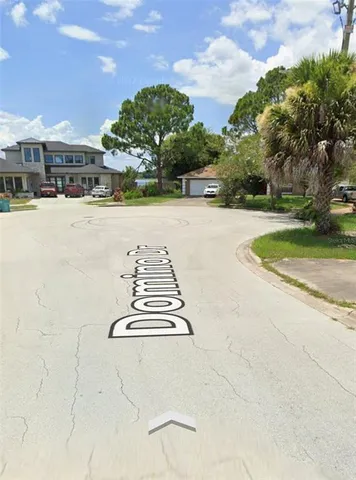 a view of street with houses
