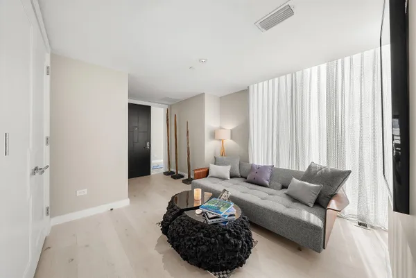 a view of table and chair with potted plant