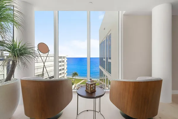 a living room with furniture and view of living room