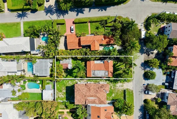 an aerial view of houses and roads