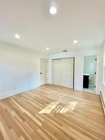 a bathroom with a sink toilet and vanity