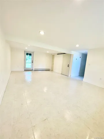 a bathroom with a sink toilet a mirror and shower