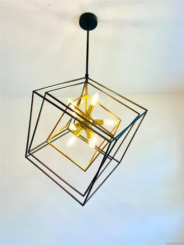 a view of kitchen and dining room with wooden floor