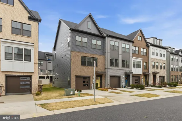 a front view of a building with glass windows