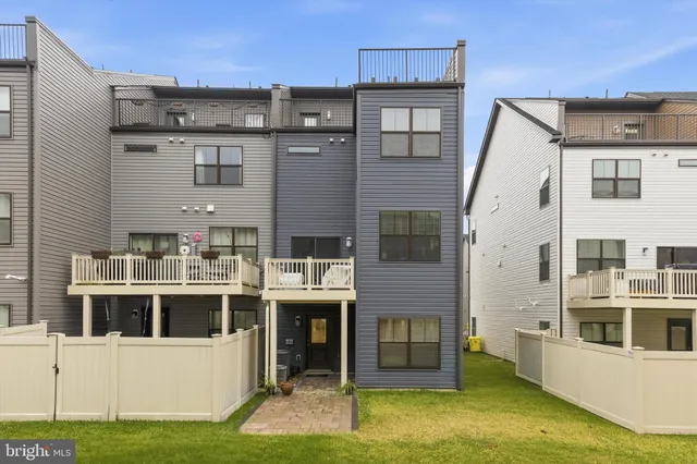 a view of a swimming pool with seating area