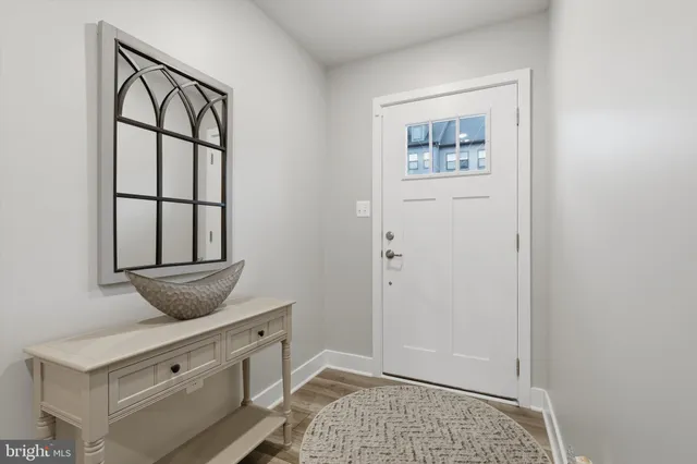 a view of a hallway with closet