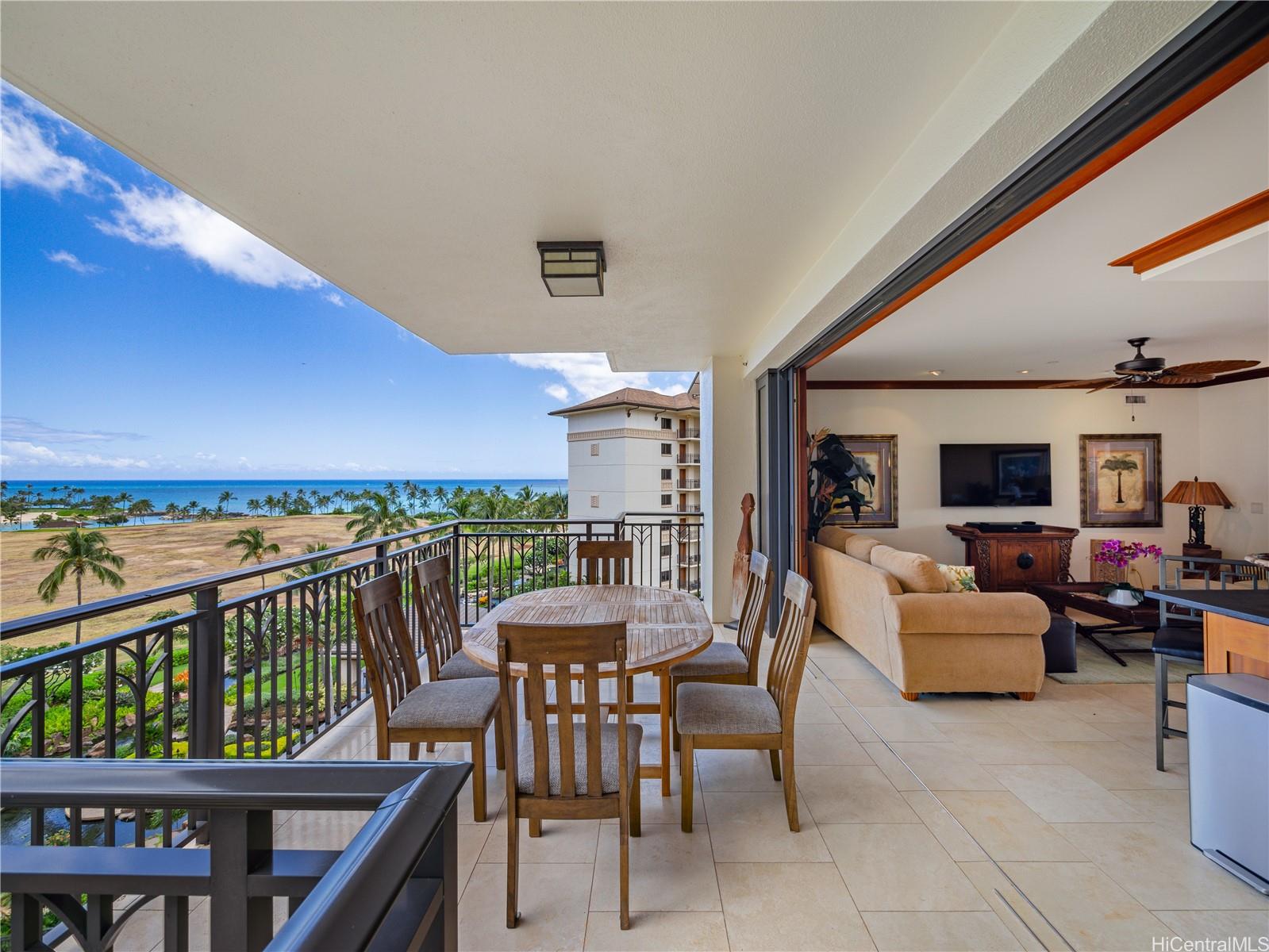 92-104 Waialii Place, Unit O712 Kapolei, HI 96707 - Photo 2 of 25 a view of a patio with swimming pool and furniture