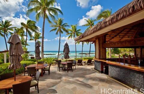 92-104 Waialii Place, Unit O712 Kapolei, HI 96707 - Photo 21 of 25 a view of a patio with swimming pool table and chairs