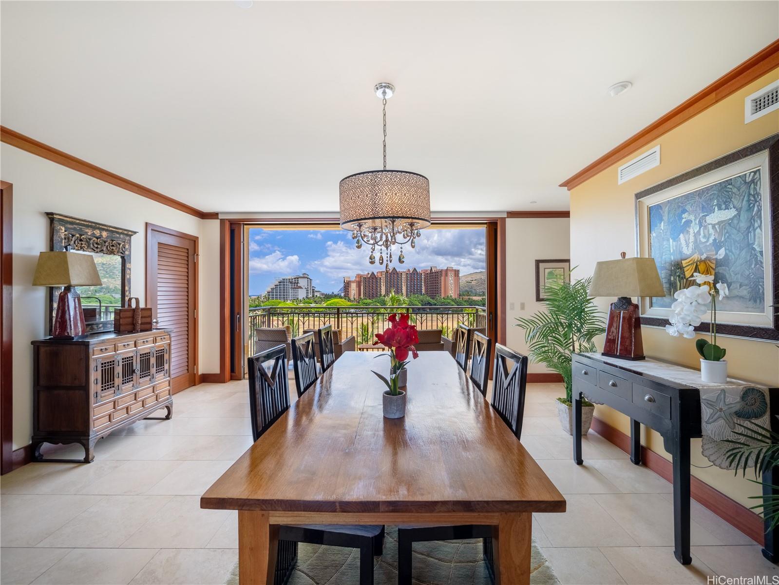 92-104 Waialii Place, Unit O712 Kapolei, HI 96707 - Photo 7 of 25 a dining room with furniture and window
