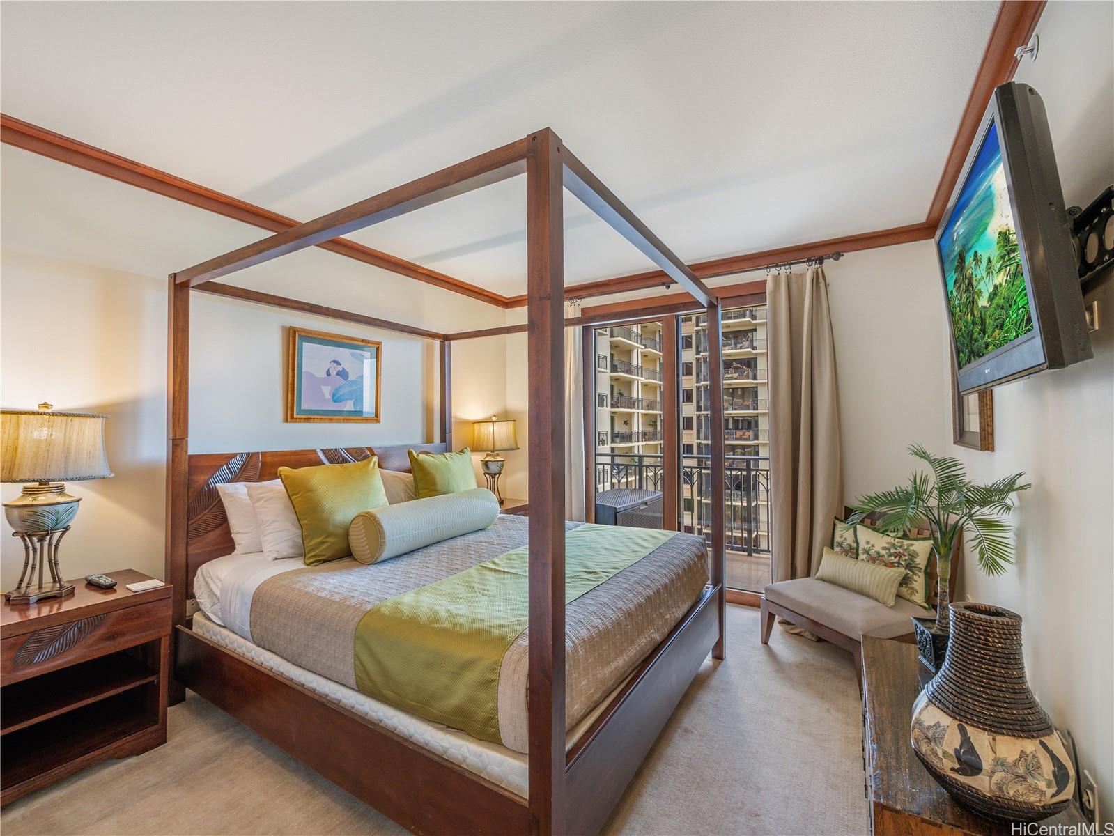 92-104 Waialii Place, Unit O712 Kapolei, HI 96707 - Photo 9 of 25 a bed room with a bed and a couch