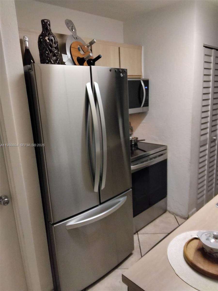 18318 Northwest 68th Avenue, Unit E Hialeah, FL 33015 - Photo 2 of 7