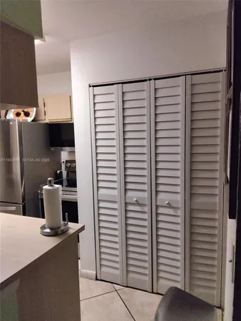 a kitchen with a window