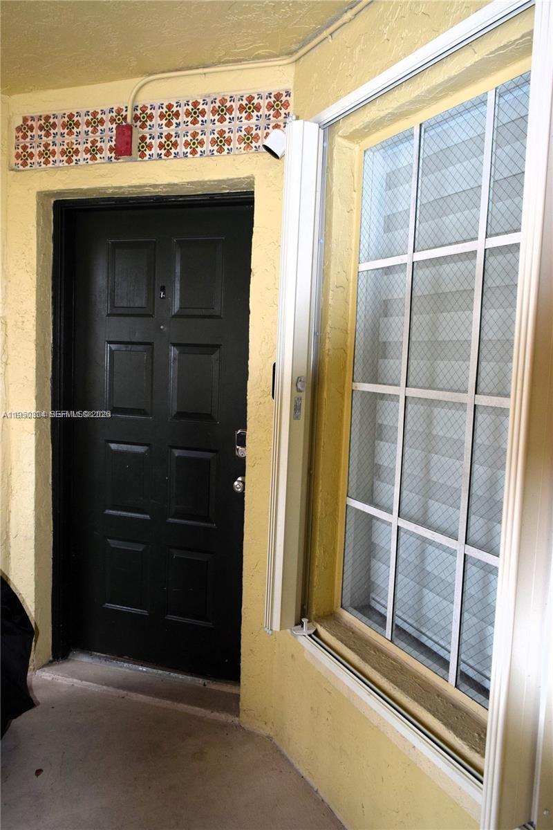 18318 Northwest 68th Avenue, Unit E Hialeah, FL 33015 - Photo 7 of 7