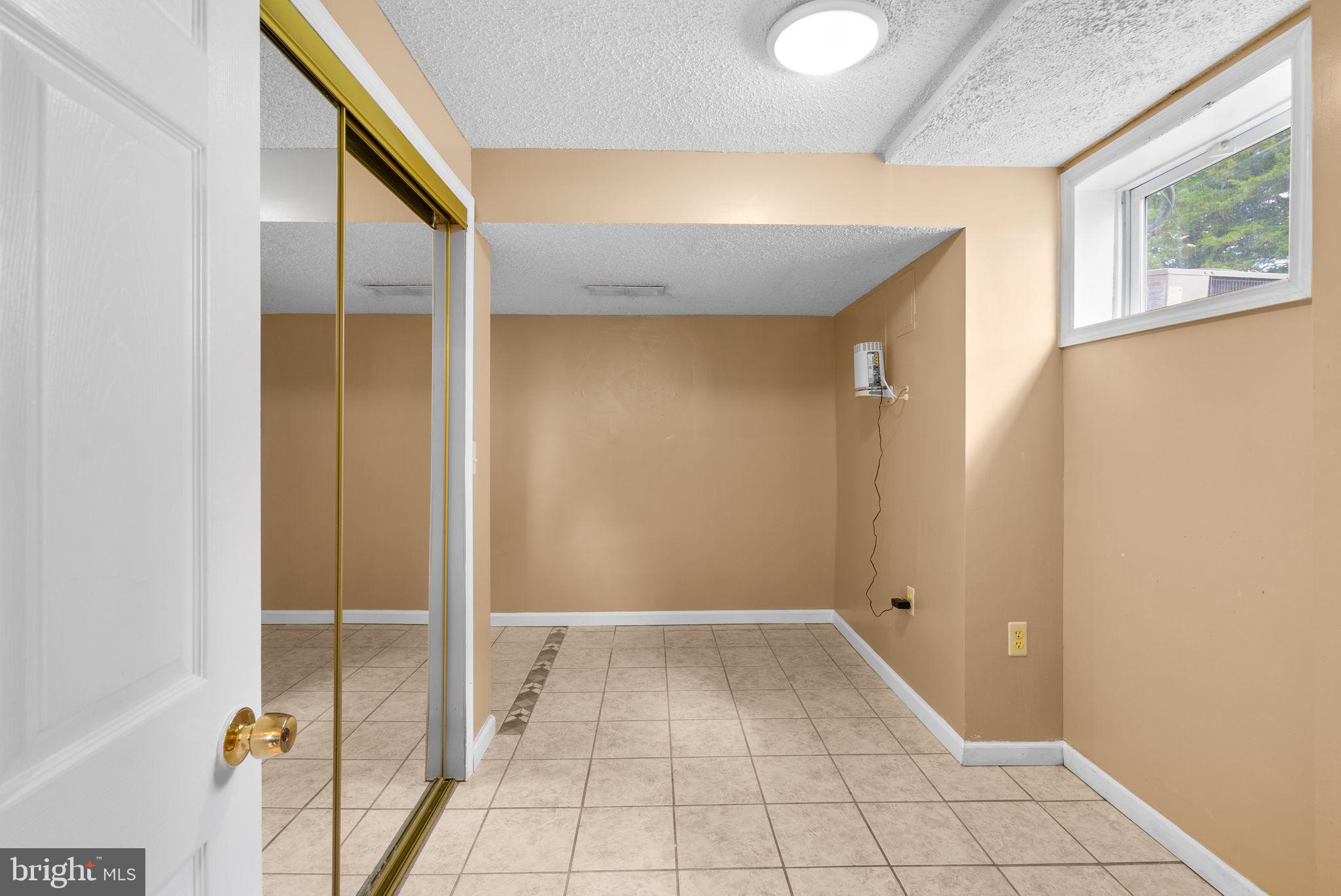 4502 Hargrove Road Temple Hills, MD 20748 - Photo 16 of 31 Spacious finished basement