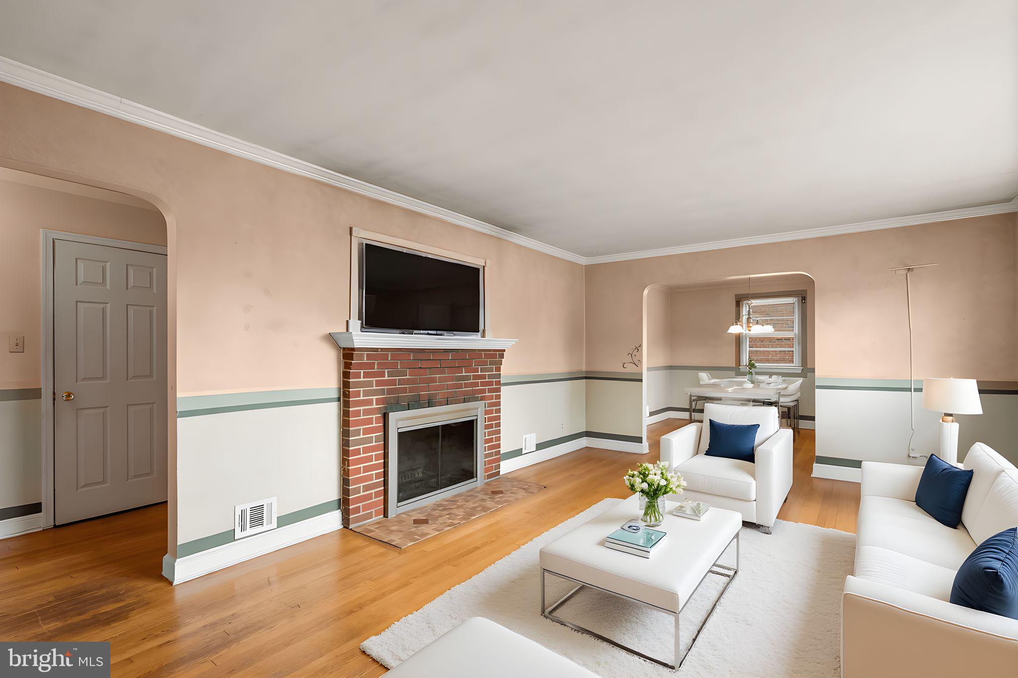 4502 Hargrove Road Temple Hills, MD 20748 - Photo 6 of 31 Living room w/ fireplace (virtually staged)