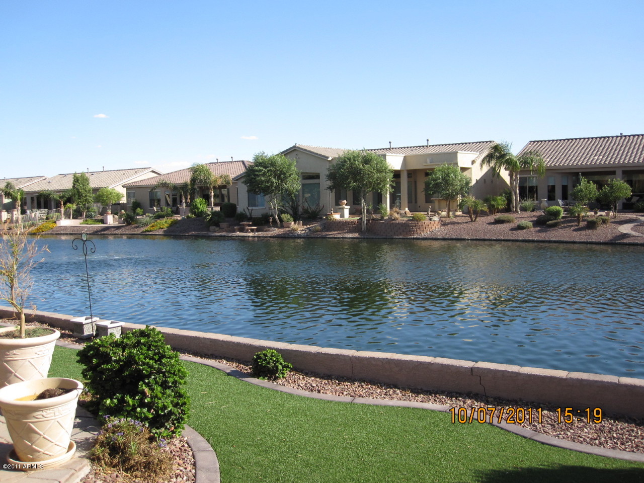 42449 Abbey Road Maricopa, AZ 85138 - Photo 12 of 19 Lake view in the backyard