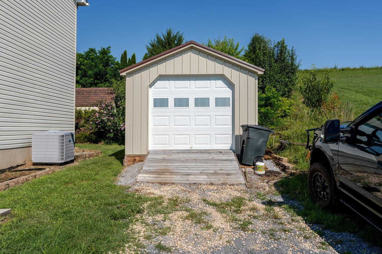 107 Orchard Road Staunton, VA 24401 - Photo 21 of 44 a front view of a house with a yard