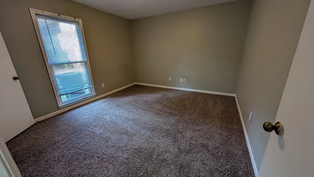 an empty room with a door