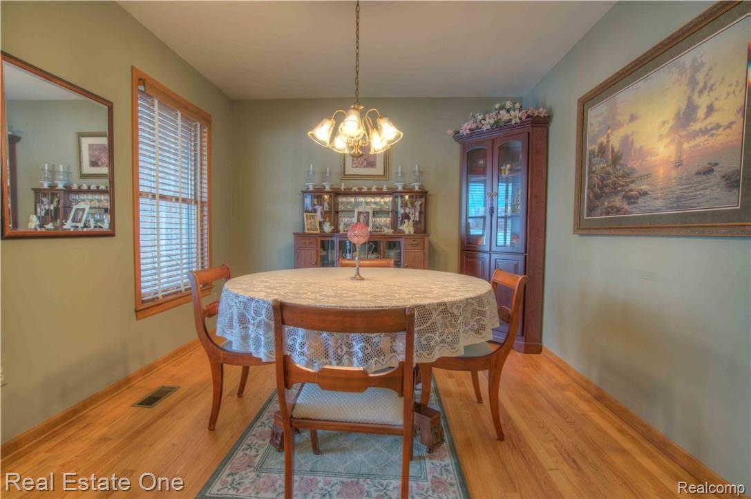 59935 9 Mile Road South Lyon, MI 48178 - Photo 8 of 31 Dining Room W/Wood Floor
